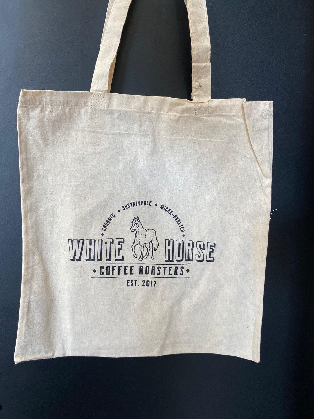 White Horse Tote Bag Exclusive - Perfect for coffee enthusiasts, this merch makes for the ultimate gift from White Horse Coffee Roasters.