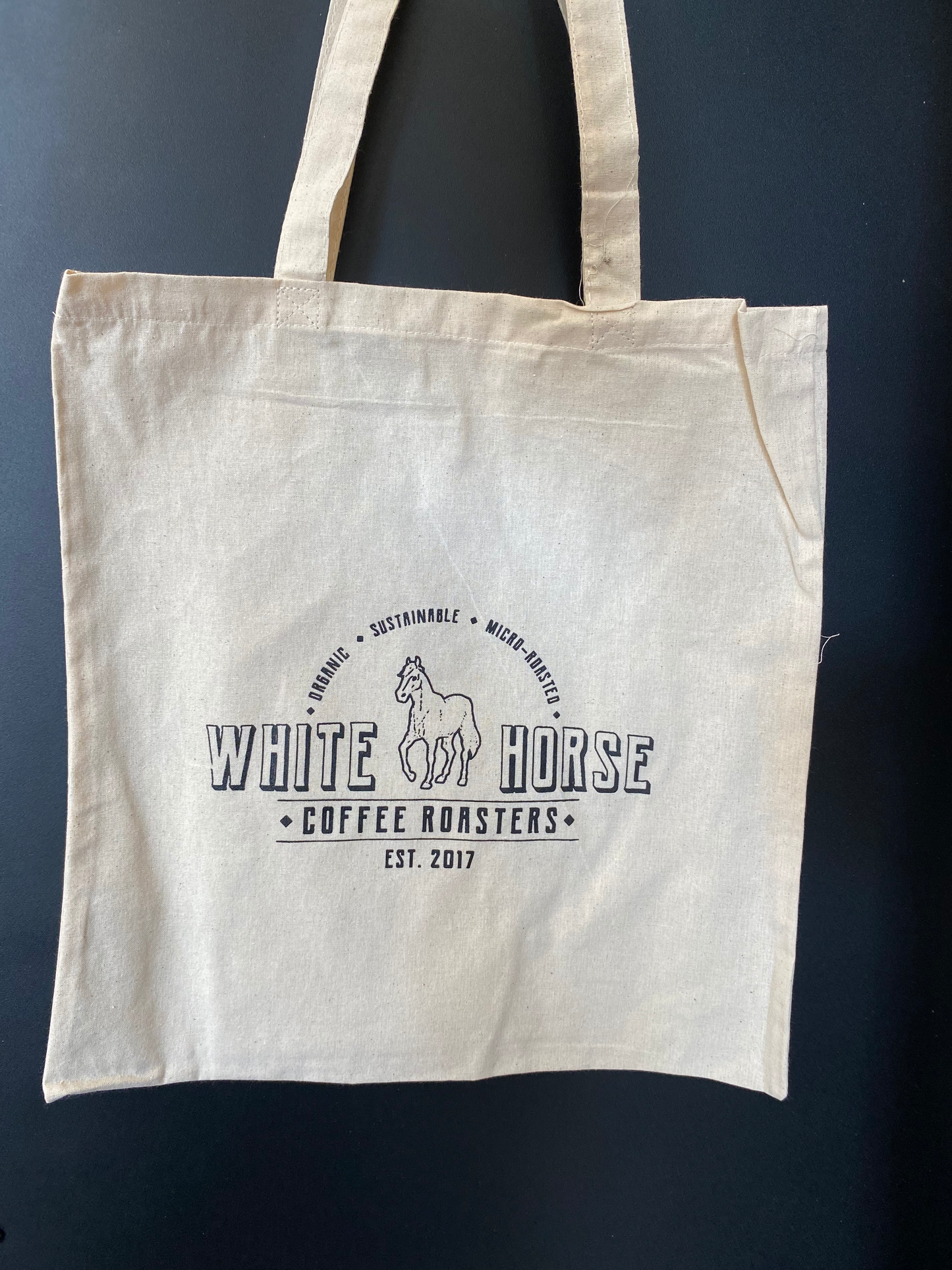 White Horse Tote Bag Exclusive - Perfect for coffee enthusiasts, this merch makes for the ultimate gift from White Horse Coffee Roasters.